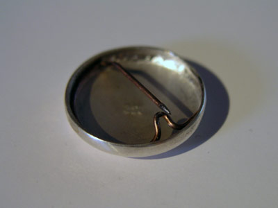 1 inch solid silver badge backside